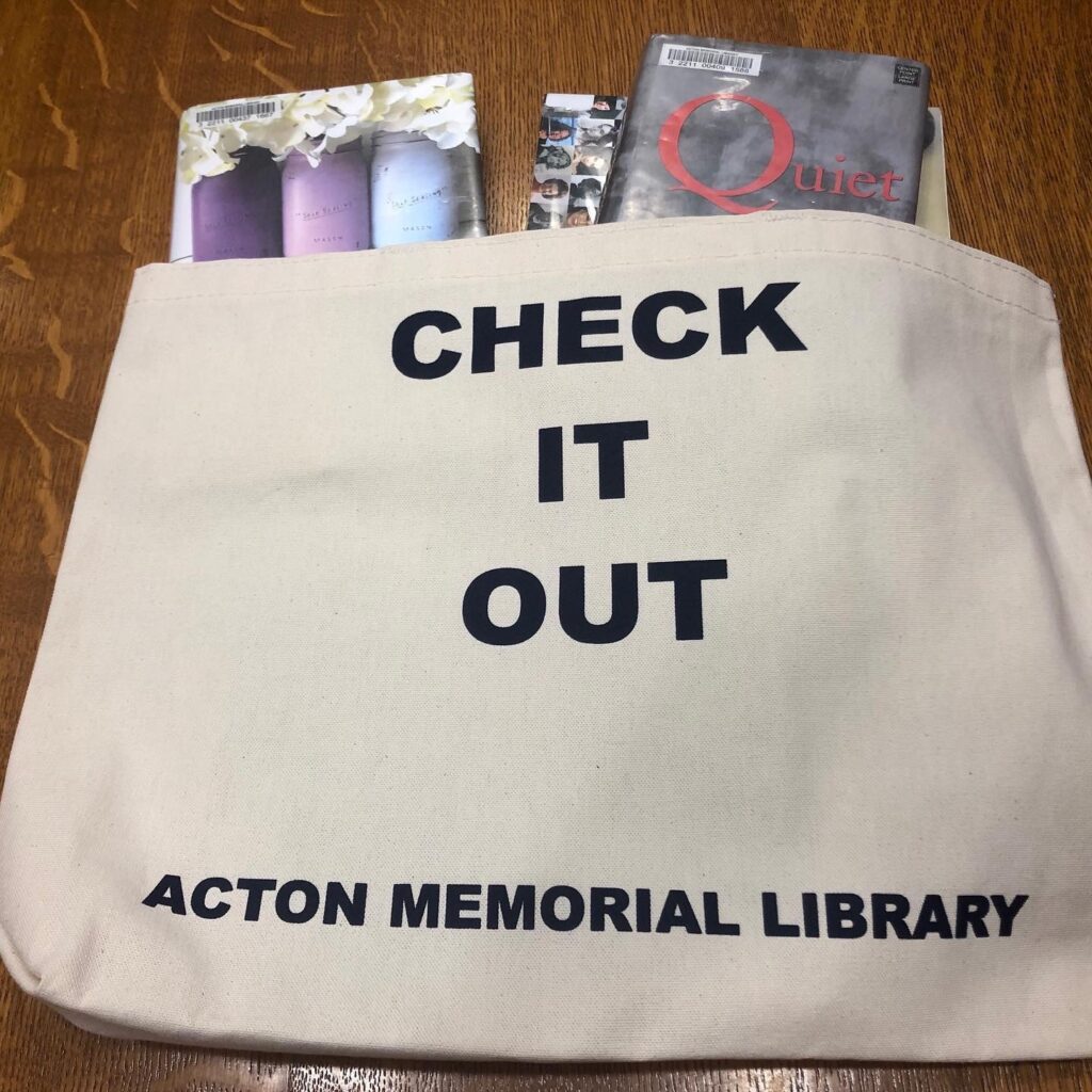 Canvas tote bag with books inside